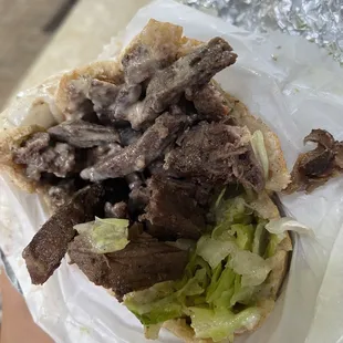 Beef Shawarma Rolls . Generous amount of meat but  seasoning was off. Also chopped lettuce was very weird. Do not recommend this!!