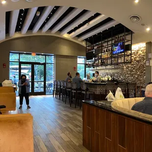 people sitting at the bar