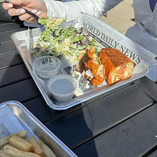 Buffalo chicken wrap with side salad and ranch dressing. Yum!!