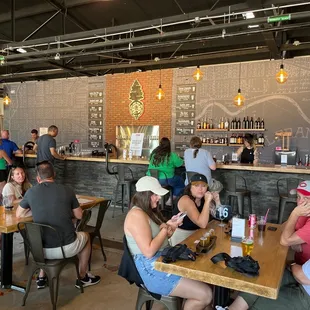 a large group of people sitting at tables