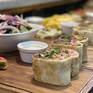 a variety of food items on a cutting board