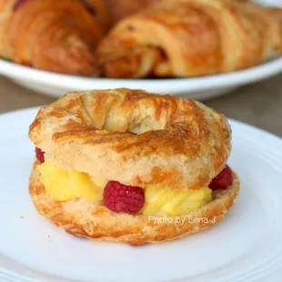 Paris Brest with vanilla bean pastry cream and raspberries inside