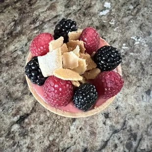 Raspberry tart with mixed fruit