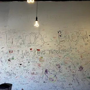 The cool wall with writing on it