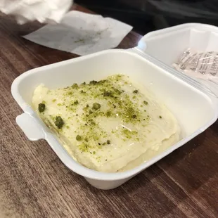 a square dish of food on a table