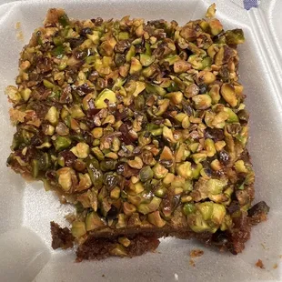 a piece of cake in a styrofoam container