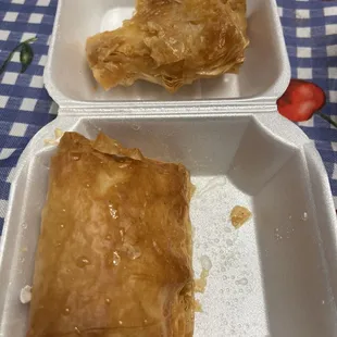 a pastry in a styrofoam container