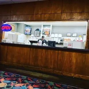 a man behind the counter
