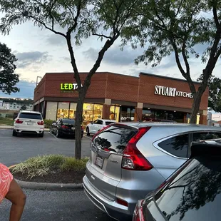 a woman standing in a parking lot