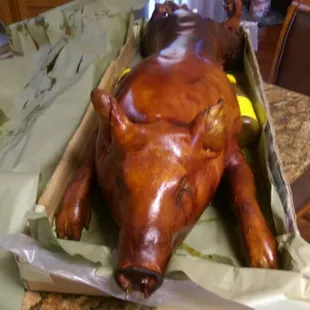 a pig in a box on a table