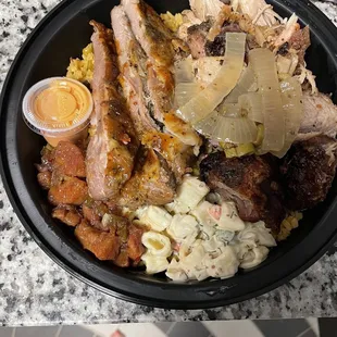 Ribs &amp; Chicken rice bowl, pasta salad, plantain relish, &amp; yuca.