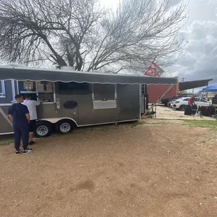 Outside. No seating but I don't have a problem tailgating.