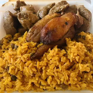 Carne guisada with arroz con gandules and plantains