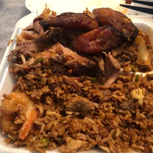  a plate of rice and meat