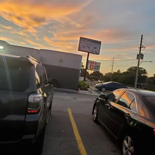 two cars parked in a parking lot