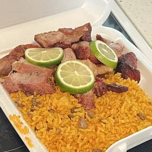 a plate of rice and meat