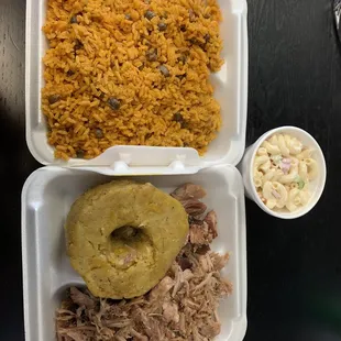 Arroz con gandules, ensalada de coditos, peril and mofongo  Their portions are huge for a great price! Love it!