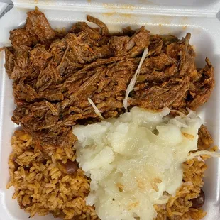 ROPA VIEJA Yuca red beans and rice
