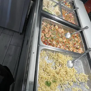 The sides--from green salad, potato salad, ceviche and macaroni salad.