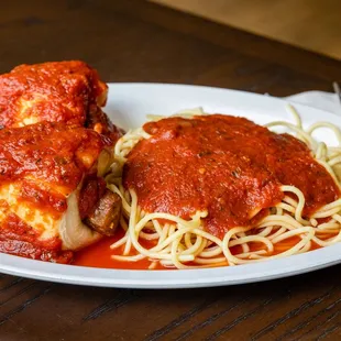 a plate of spaghetti and meat