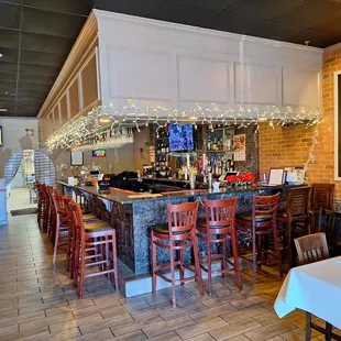 This is the bar, and there is some more restaurant seating in front of it.