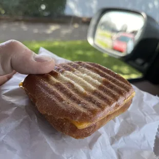 A mini panini with American Cheese