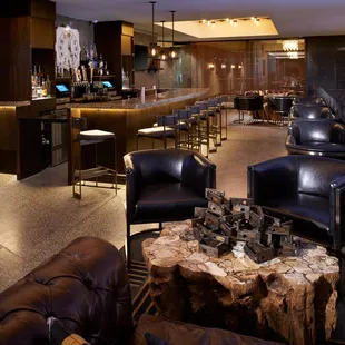 Tucked above the lobby, this intimate lounge is made for conversation and people watching.