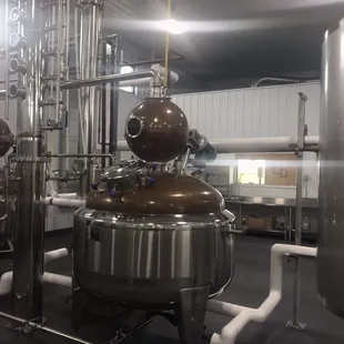 a row of stainless steel tanks