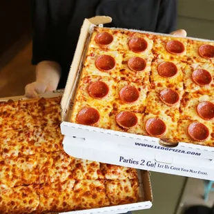 two boxes of pepperoni pizza