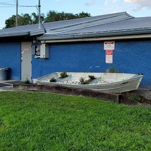 The building's exterior as seen from the parking lot; the entrance is to the right, out of frame.
