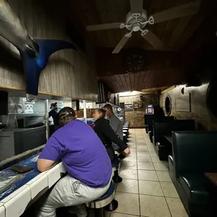 customers sitting at the counter