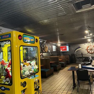 a yellow vending machine