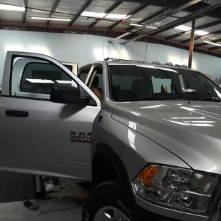 Brand new dealer truck changing carpet