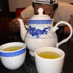 a man drinking tea