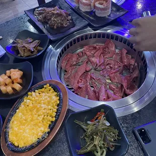 Brisket, cheese corn, garlic pork belly, banchan