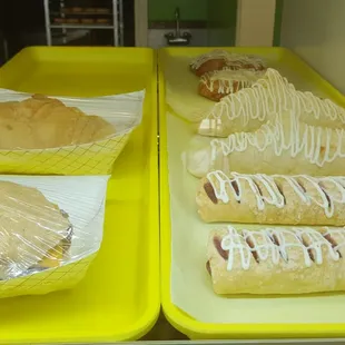 a variety of pastries on trays