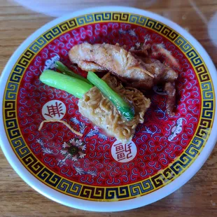 Serving of Chicken Choi Sum Cake Noodles