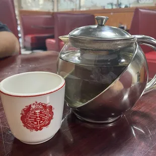 Hot green tea in a nice little pot