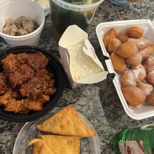 Sugar Donuts, General Tso&apos;s Chicken, crab rangoons, Hong Kong Wonton Soup and Spare rib with Black bean dumpling.
