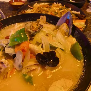 Seafood Noodle Soup (note: not indicated spicy on the menu, but chopped red peppers inside)