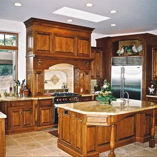a large kitchen with a center island