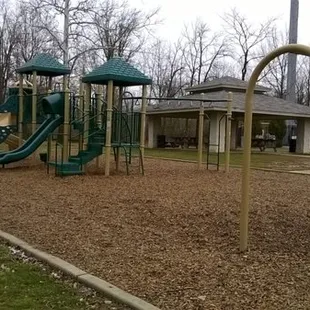 Playground at Lee Road Park, shelter in background.