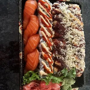 Salmon nigiri, spicy salmon roll, two kpop rolls! Extra ginger