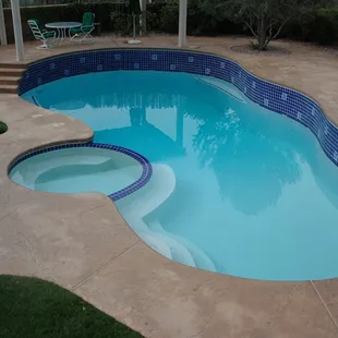 Pool Remodel, new plaster, tile and colored concrete pool deck