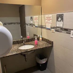 Men&apos;s sink area.