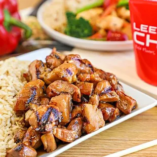 a plate of chicken and rice