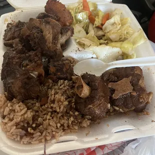 Oxtail dinner with extra gravy on the side. Very delicious and flavorful. Sorry I didn&apos;t take the picture before I started to eat.