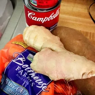carrots, potatoes, carrots, and a can of soup