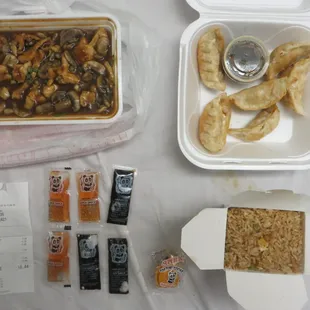 Mushroom chicken ($9.99) with fried rice and 6 pan-fried pork dumplings ($5.99)