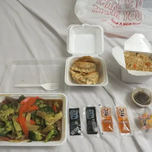 Beef with broccoli ($10.99) and 6 pan-fried pork dumplings ($5.99)